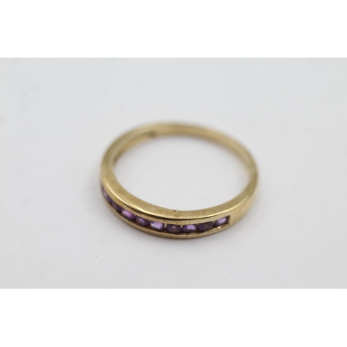 1008 - A hallmarked Birmingham 9ct gold amethyst channel setting half-eternity ring, size R½ - approx. gros... 