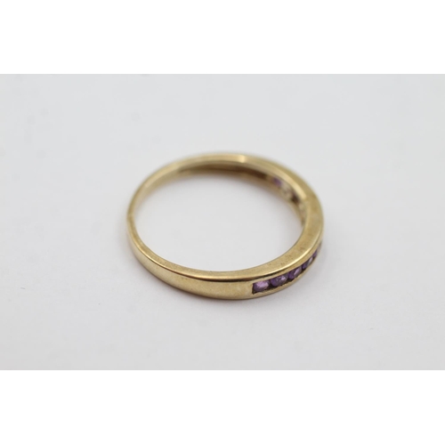 1008 - A hallmarked Birmingham 9ct gold amethyst channel setting half-eternity ring, size R½ - approx. gros... 