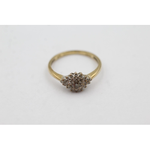 1009 - A 9ct gold diamond cluster ring, size J½ - approx. gross weight 1.4 grams