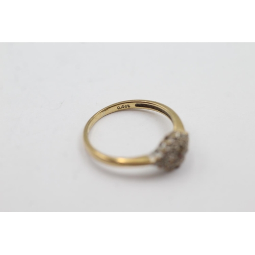 1009 - A 9ct gold diamond cluster ring, size J½ - approx. gross weight 1.4 grams