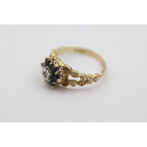 1010 - A hallmarked London 9ct gold diamond and sapphire ornate halo dress ring, size M - approx. gross wei... 