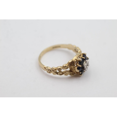 1010 - A hallmarked London 9ct gold diamond and sapphire ornate halo dress ring, size M - approx. gross wei... 