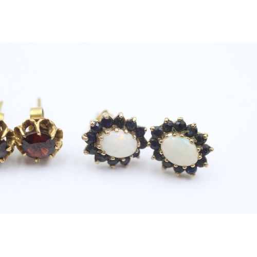 1013 - Three pairs of 9ct gold gemstone stud earrings, one amethyst, one garnet and one opal and sapphire -... 