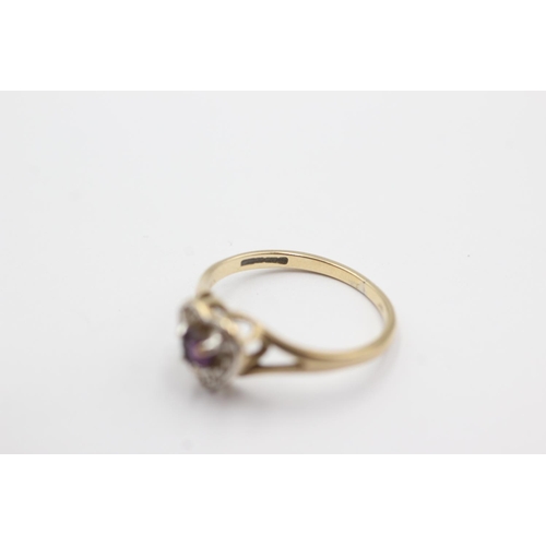 1017 - A 9ct gold diamond and amethyst heart ring, size M½ - approx. gross weight 1.6 grams