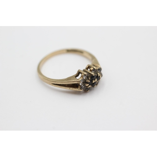 1018 - A 9ct gold sapphire and clear gemstone cluster ring, size M - approx. gross weight 2.1 grams