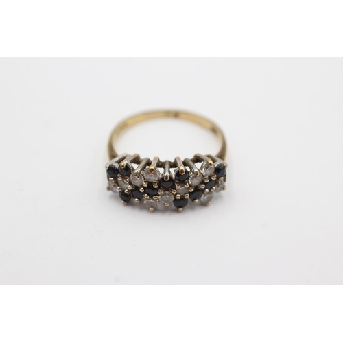 1024 - A 9ct gold sapphire and clear gemstone cluster ring, size N½ - approx. gross weight 2.3 grams