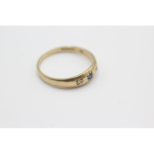 1028 - A hallmarked London 9ct gold sapphire and diamond gypsy setting ring, size N½ - approx. gross weight... 