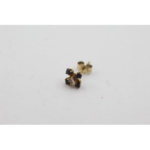 1033 - A pair of 9ct gold diamond and sapphire stud earrings - approx. gross weight 0.5 grams