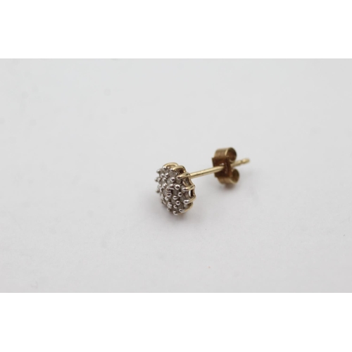 1034 - A pair of 9ct gold diamond cluster stud earrings - approx. gross weight 1 gram