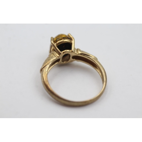 1035 - A hallmarked Birmingham 9ct gold amber solitaire dress ring, size N - approx. gross weight 2.9 grams