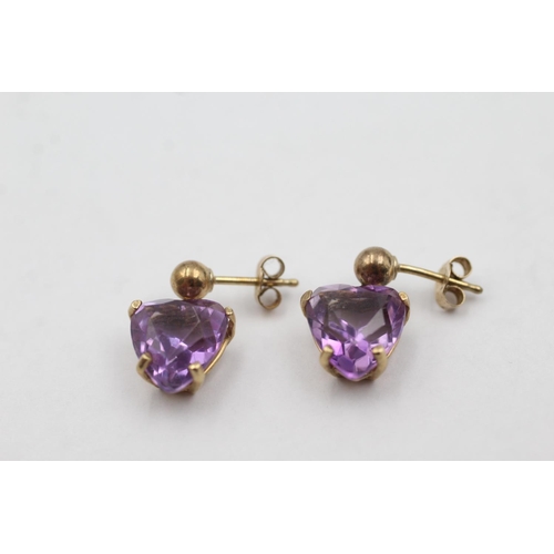 1036 - A pair of 9ct gold amethyst heart drop earrings - approx. gross weight 2.6 grams