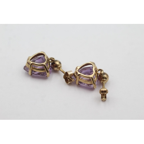 1036 - A pair of 9ct gold amethyst heart drop earrings - approx. gross weight 2.6 grams