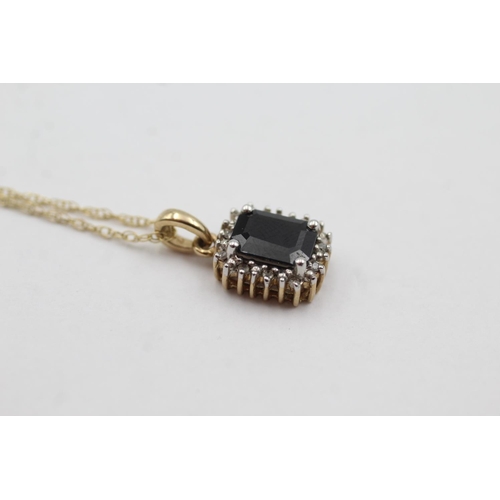 1037 - A 9ct gold sapphire and diamond halo pendant necklace - approx. gross weight 2.6 grams