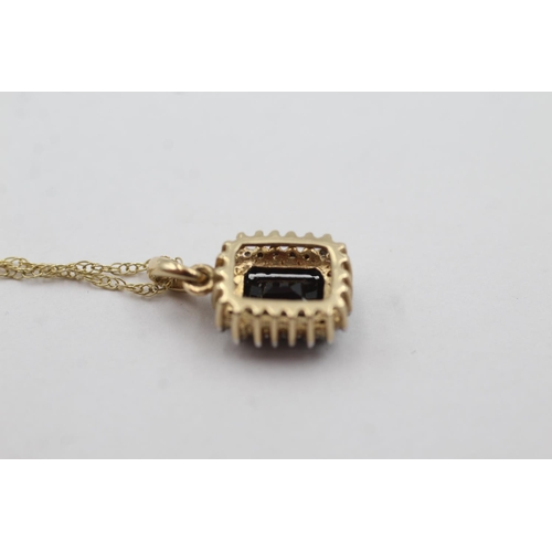 1037 - A 9ct gold sapphire and diamond halo pendant necklace - approx. gross weight 2.6 grams