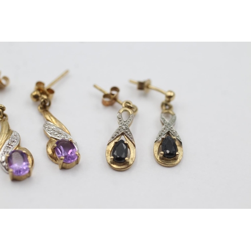 1041 - Three pairs of 9ct gold diamond and gemstone drop earrings, one amethyst and two sapphire - approx. ... 