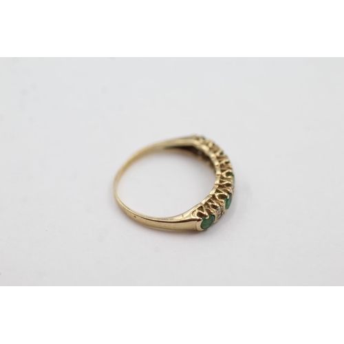 1043 - A 9ct gold emerald and diamond half-eternity ring, size J - approx. gross weight 1.3 grams