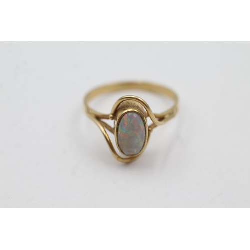 1045 - A 14ct gold opal solitaire dress ring, size O - approx. gross weight 2.6 grams