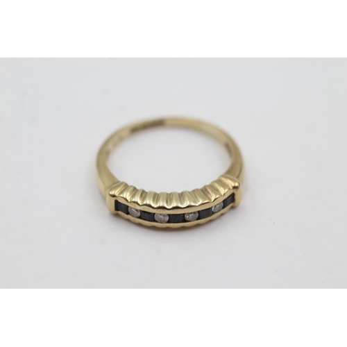 1047 - A hallmarked Sheffield 9ct gold sapphire and diamond channel setting half-eternity ring, size N½ - a... 