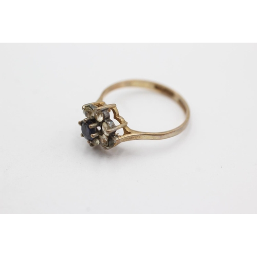 1049 - A hallmarked Edinburgh 9ct gold sapphire and clear gemstone dress ring, size M½ - approx. gross weig... 