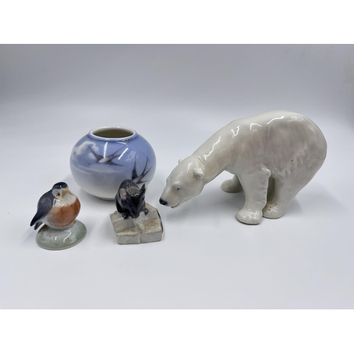 10 - Four pieces of Royal Copenhagen ceramics comprising polar bear, mouse, Robin and swallow pattern 5.5... 