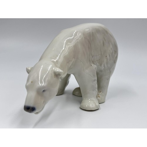 10 - Four pieces of Royal Copenhagen ceramics comprising polar bear, mouse, Robin and swallow pattern 5.5... 