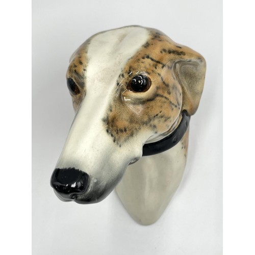 13 - A brindle greyhound ceramic wall plaque with makers mark to base - approx. 16cm high