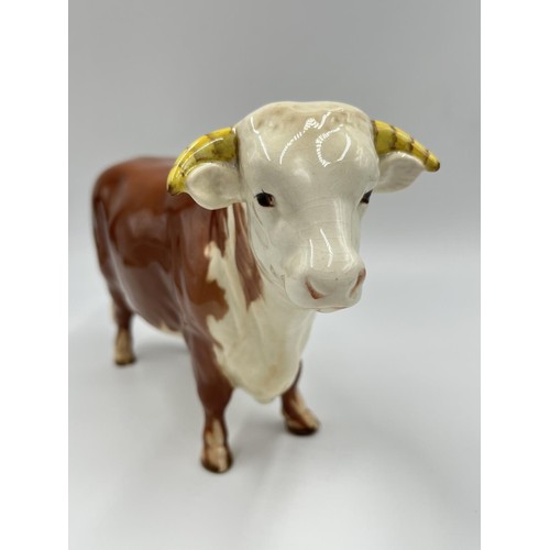 15 - A Beswick Hereford bull - RD no. 949 ceramic figurine - approx. 15cm high