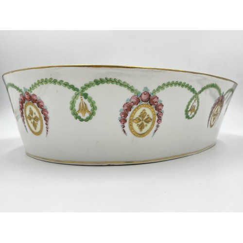 20 - A late 19th century Dresden oval dish with hand painted garland rose design - approx. 8cm high x 33.... 