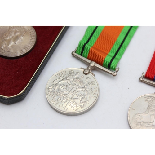 1072 - Three medals, one boxed Elizabeth II Imperial Service presented to Herbet Tye, one WWII War and one ... 