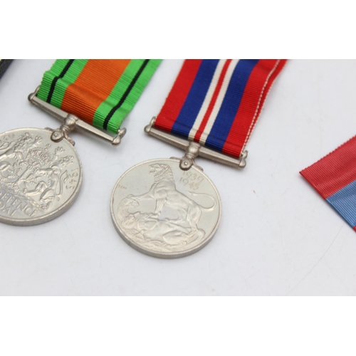 1072 - Three medals, one boxed Elizabeth II Imperial Service presented to Herbet Tye, one WWII War and one ... 