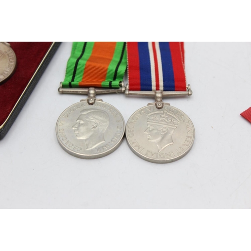 1072 - Three medals, one boxed Elizabeth II Imperial Service presented to Herbet Tye, one WWII War and one ... 