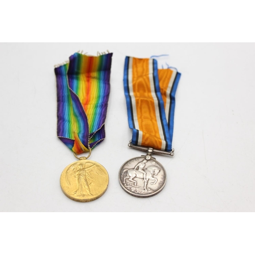 1075 - A WWI medal pair with original ribbons presented to 195982 PNR. J. Milre R.E.