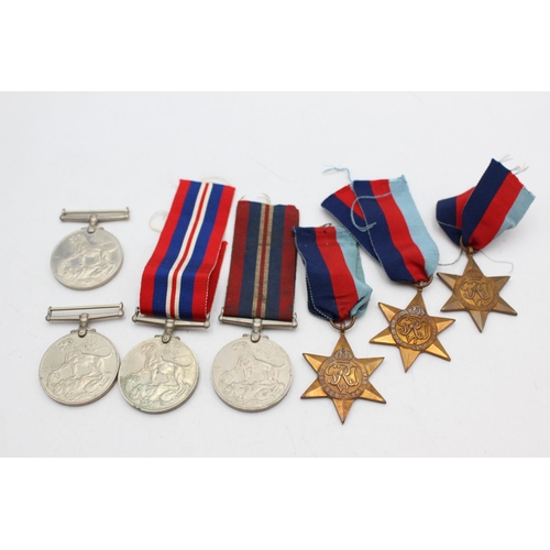 1091 - Seven WWII medals, three 1939-45 Stars and four War