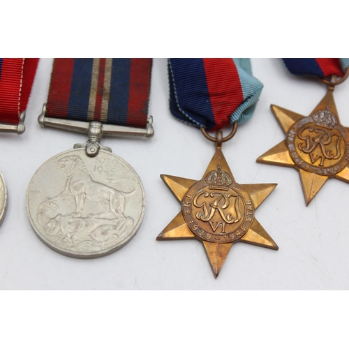 1091 - Seven WWII medals, three 1939-45 Stars and four War