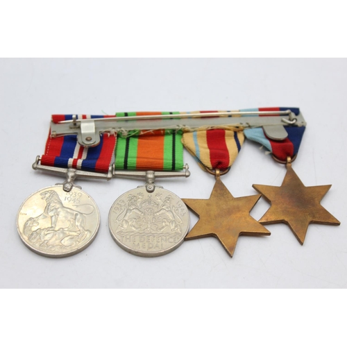 1103 - A WWII mounted medal group comprising Africa Star, 1939-45 Star, War and Defence