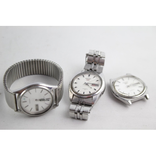 1133 - Three Seiko 5 automatic men's wristwatches - one ref. 7009-8120, one 7009-3100 and 7009-3140