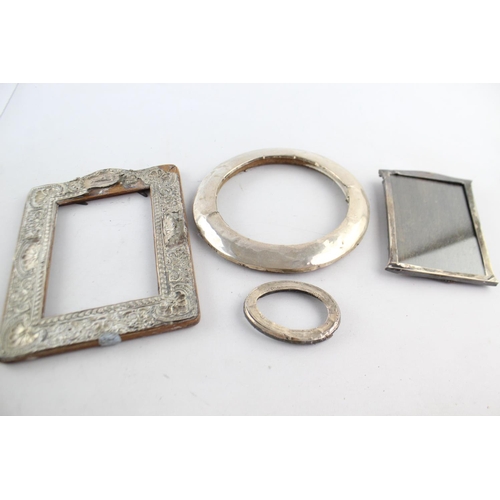 1198 - Four vintage hallmarked .925 sterling silver photograph frames