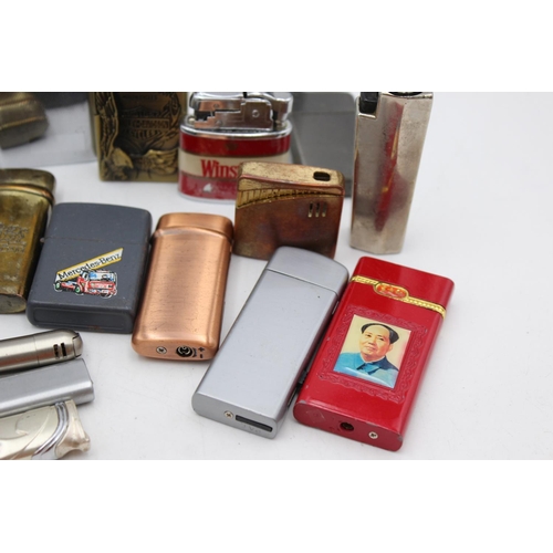 1241 - Twenty five assorted cigarette lighters to include Zippo style, novelty etc.