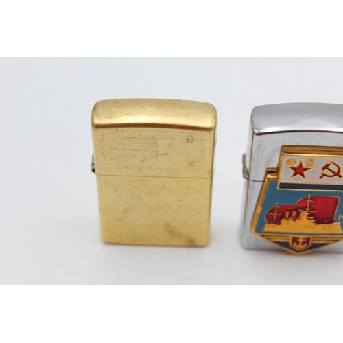 1245 - Three assorted Zippo cigarette lighters