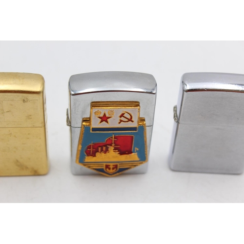 1245 - Three assorted Zippo cigarette lighters