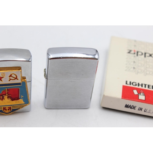 1245 - Three assorted Zippo cigarette lighters