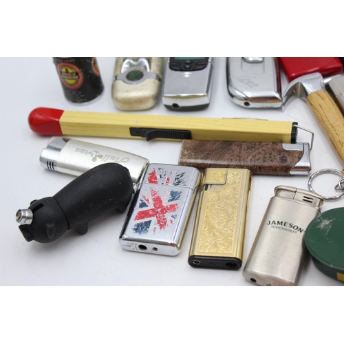 1255 - Thirty assorted cigarette lighters to include Zippo style, novelty etc.