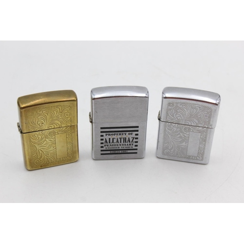 1257 - Three assorted Zippo cigarette lighters