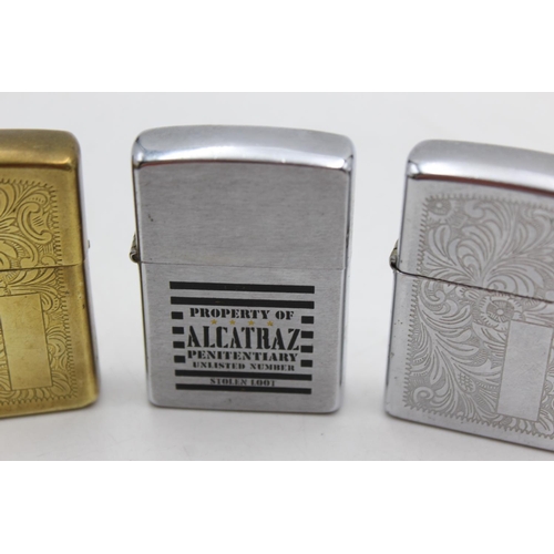 1257 - Three assorted Zippo cigarette lighters