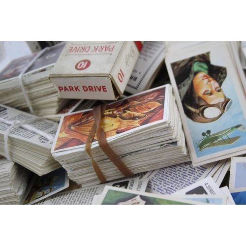 151 - A collection of assorted vintage cigarette and tea cards to include silks, railways etc.