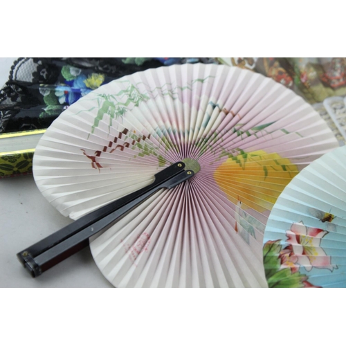 211 - A collection of assorted vintage women's hand fans