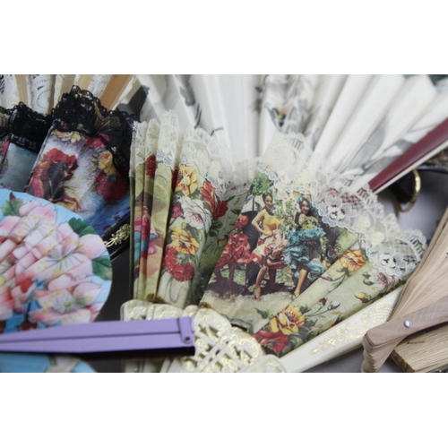 211 - A collection of assorted vintage women's hand fans