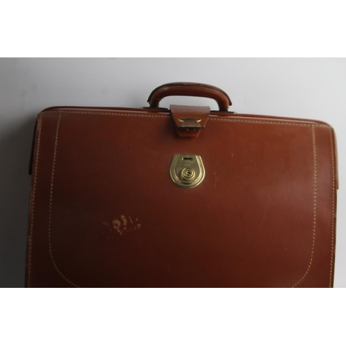 212 - Five antique suitcases and briefcases