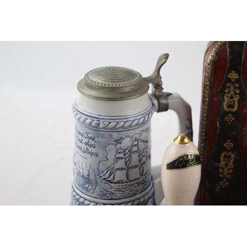 213 - A collection of antique and vintage brewing items to include Royal Selangor, decanters, steins etc.