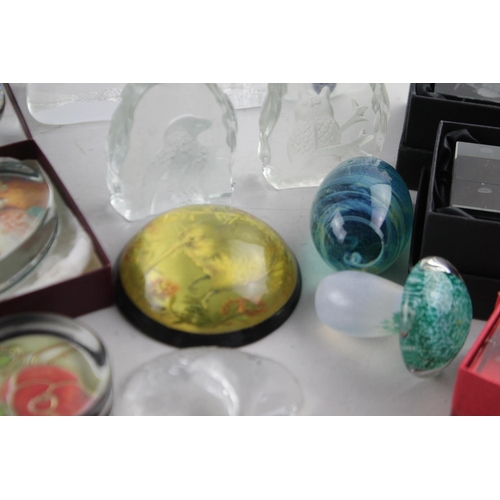 46 - A collection of studio glass paperweights and ornaments to include Millefiori, Dartington Crystal et... 